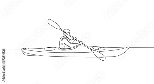 Kayaker paddling on calm water