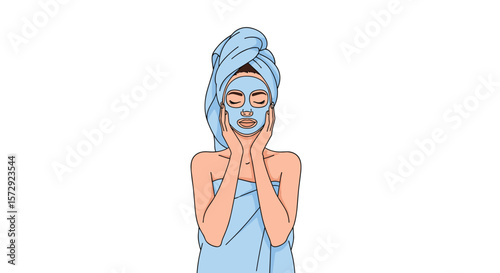 Woman applying face mask wrapped in towel enjoying skincare routine
