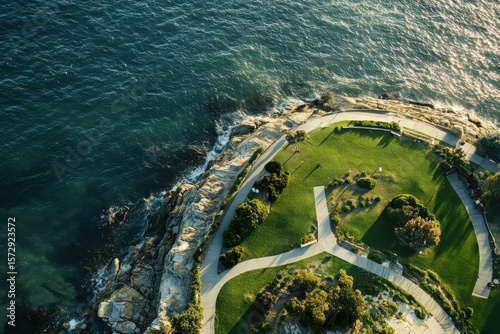 Scenic view of Sydney Marks Park on Mackenzies point with lush greenery and coastal waters, Sydney Marks Park on Mackenzies point of sea coast Bondi district aerial photo