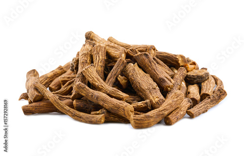 closeup pile of dry dandelion root herb for loose tea cutout