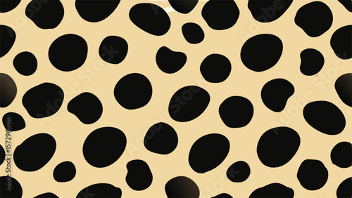 Seamless pattern of irregular black spots on a light beige background abstract