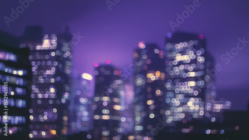 Wallpaper Mural Blurry Neon-Lit Cityscape with High-Rise Buildings at Night Torontodigital.ca