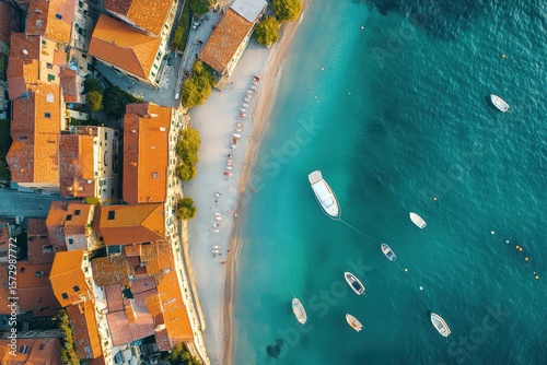 Aerial view of Riva Ligure showcasing coastline, boats, and beautiful beach on the Italian Riviera, Aerial view of Riva Ligure on the Italian Riviera in the province of Imperia, Liguria, Italy
