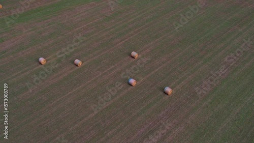 Aerial shot of hay bales in field in Kansas
