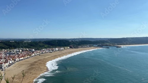 Beach on the ocean from above. Big waves on the ocean beach. Panorama of the ocean coast. General plan of the ocean coast from above.