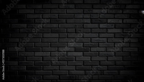 Dark monochrome brick wall with subtle texture and gradient lighting effect
