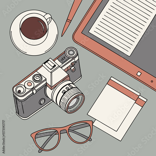 Coffee camera and reading accessories flat lay