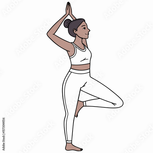 woman practicing yoga tree pose exercise