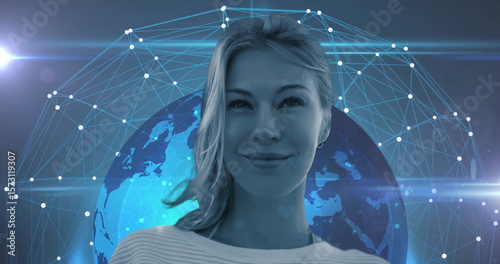 Standing woman wearing ribbed top facing blue network background, with globe overlay and mesh nodes