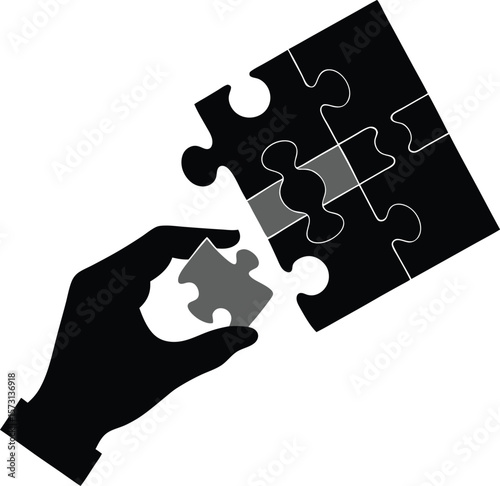 jigsaw puzzle in progress with hand placing a piece