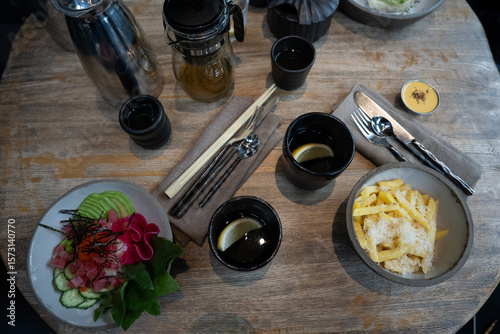 An Elegant Dining Setup Featuring Fresh Ingredients and Exquisite Culinary Artistry
