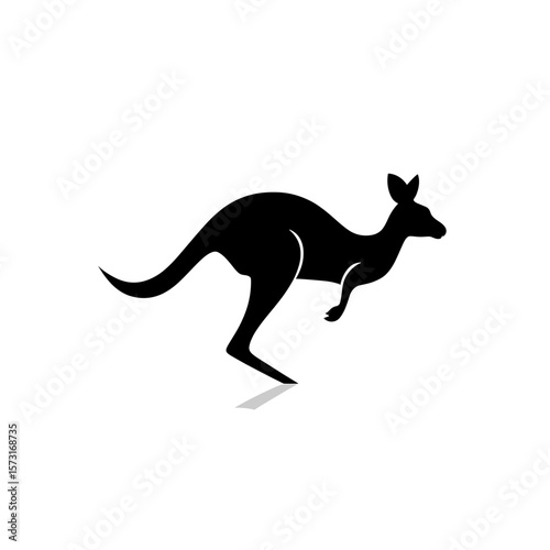 Silhouette of a kangaroo in mid leap with a long tail and pointy ears in a side profile view, isolated