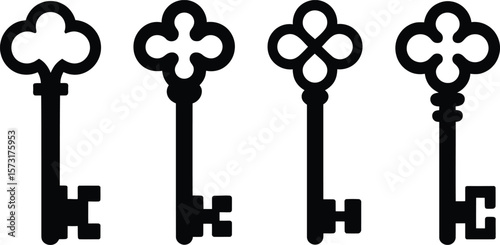 Collection of four stylized antique black key silhouettes