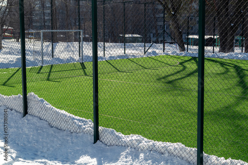Empty school soccer field in winter