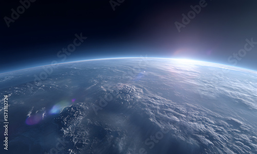 a panoramic view of earth from space with the sun rising on one side and a planet in the blue and hazy atmosphere