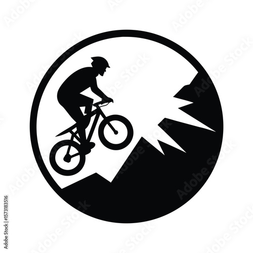 Silhouette of a mountain biker on rough terrain for extreme sport fitness and biking action