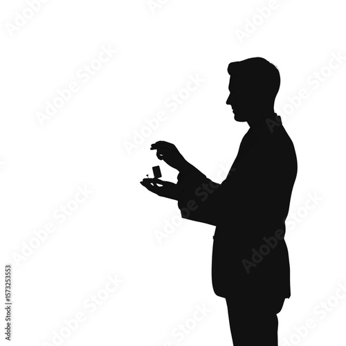 Silhouette of a Man Presenting a Ring