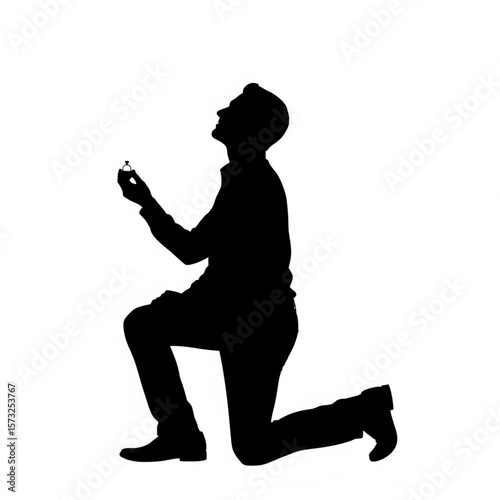 Silhouette of Man Proposing with Ring
