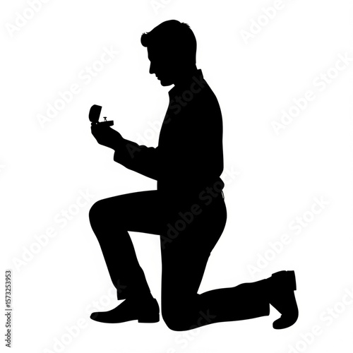 Silhouette of Man Proposing with Engagement Ring