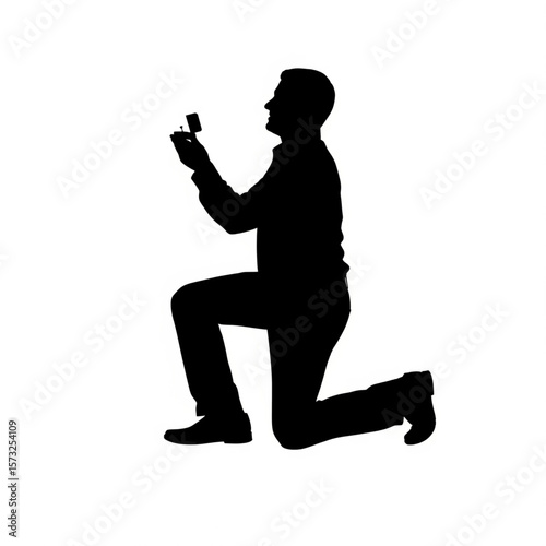Proposal Silhouette: Man Offering Engagement Ring