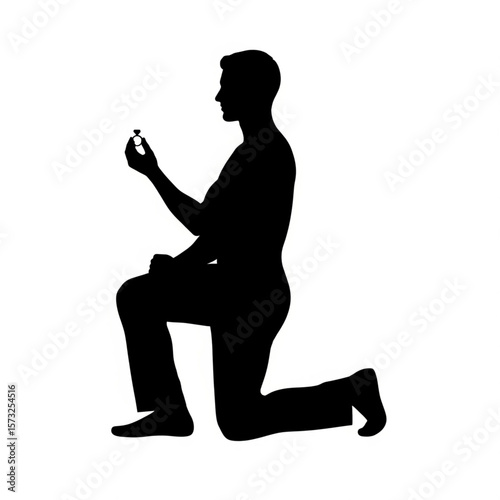 Proposal Silhouette: Man on Knee with Engagement Ring
