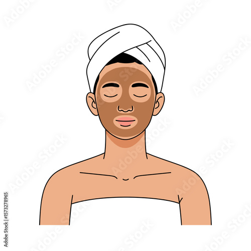 Young woman with a facial mask relaxing at home in a towel  