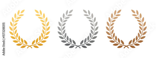 Gold silver and bronze laurel wreaths representing first second and third place awards and achievements