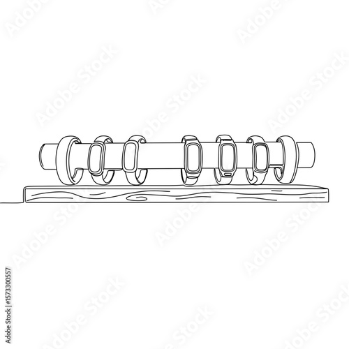 Wristbands on wooden shelf in minimalist style with neutral colors  