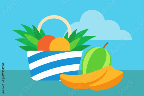 tropical fruit basket beside beach towel