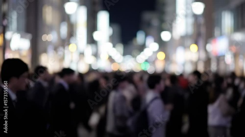 Wallpaper Mural Blurred crowd of people on a city street at night with bright lights Torontodigital.ca