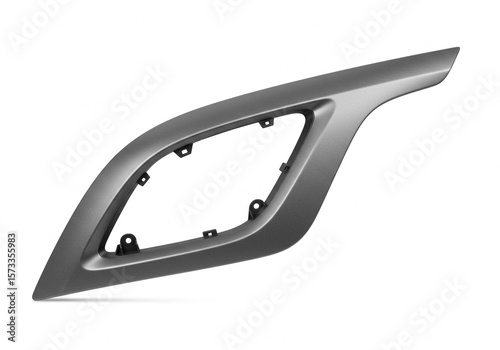 Isolated gray plastic trim piece with mounting points on a white background in studio lighting