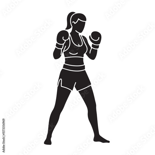 Athletic woman in boxing gloves stands poised, ready for action and combat training