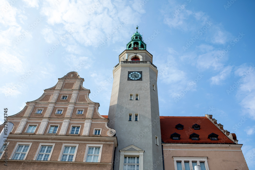 Fototapeta premium Historic Town Hall Clock Tower and Gabled Building, Olsztyn, Poland