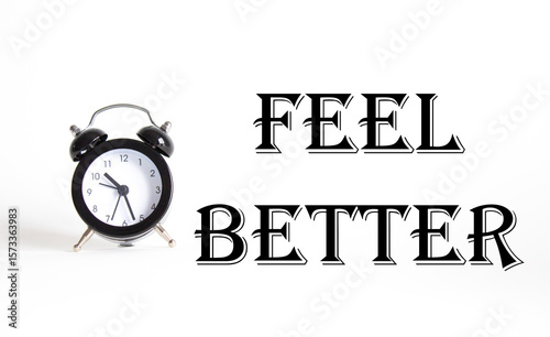Feel better symbol. Beautiful white background with alarm clock. Business and Feel better concept. Copy space.
