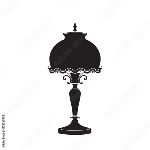 A classic antique electric brass table lamp with a glass shade, perfect for vintage interior decor