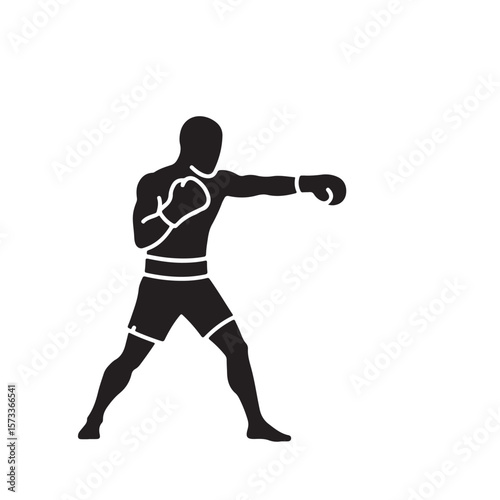 Barefoot boxer throws a punch with a gloved fist against the white background