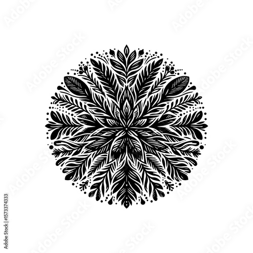 Intricate black and white floral design, symmetrical and radiating outwards.