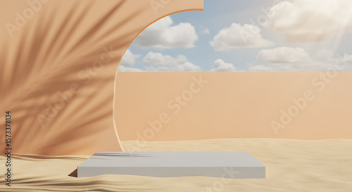 Minimalist product display platform with palm shadow on sand against a cloudy blue sky