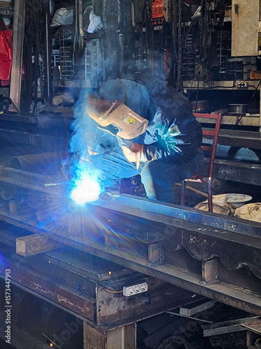 engineer welding iron