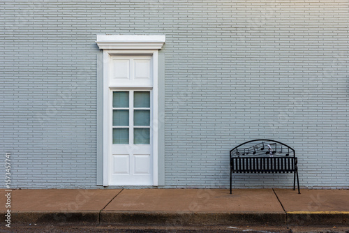 Minimalist Street Scene with Door and musical bench