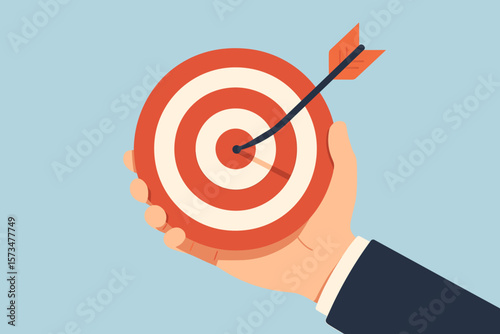 Business success target achievement, hand holding bullseye dartboard with arrow hitting center, goal setting, focus, leadership, motivation, strategy, winning concept illustration