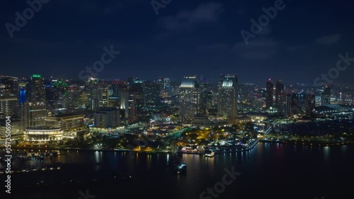 Wallpaper Mural Experience breathtaking aerial shots of Downtown San Diego, which come alive at night as they beautifully illuminate the vibrant skyline and the picturesque waterfront area, created for admiration Torontodigital.ca
