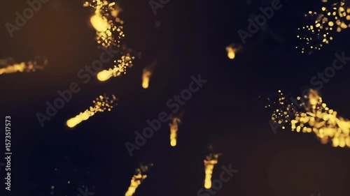 Shimmering gold dust particles dancing in dark space  