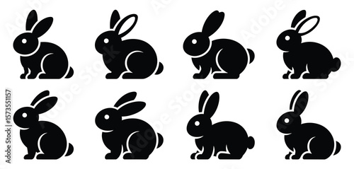 Collection of eight black silhouette bunny icons on a white background