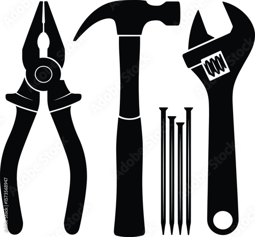 Collection of black silhouette tools including pliers hammer adjustable wrench and nails on a white background