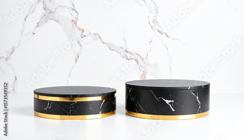 Black marble podiums on white marble