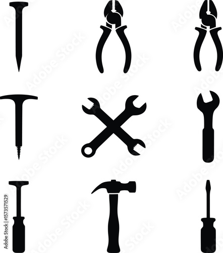 Collection of black silhouettes of common hand tools on a white background