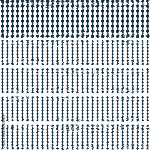 Vertical rows of chains consisting of dots and connecting lines. Part of the pattern is distorted at the edges of the chains.