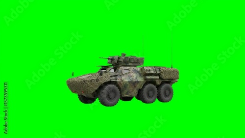 Camouflaged Military Vehicle Isolated Against A Green Screen For Compositing Use