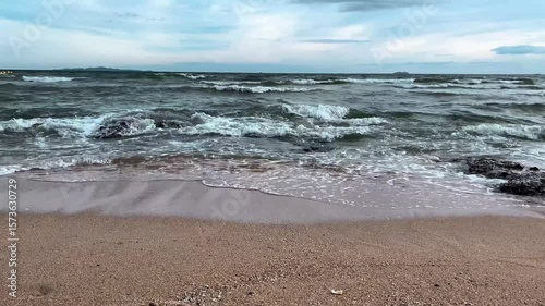 Wallpaper Mural Sea waves crash against the rocky shore, creating white foam. Waves rocky shore. Torontodigital.ca